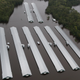 Chicken farm buildings are inundated with floodwater from Hurricane Florence near Trenton, North Carolina.